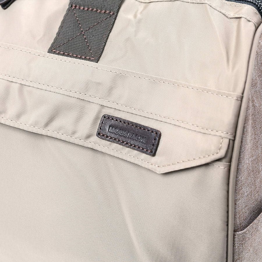 公式】 MOUSTACHE トラベルボストンバッグ(S) ナイロンツイルx杢調